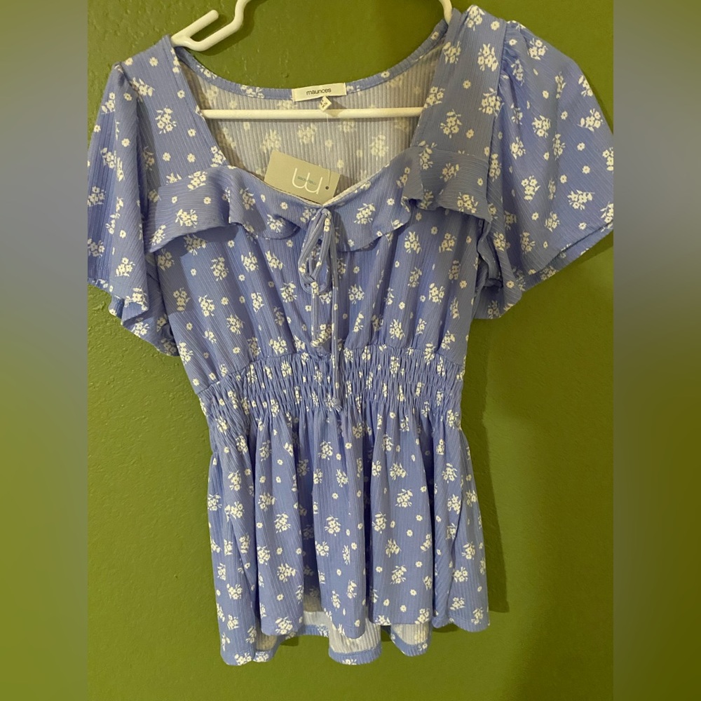 White Flowers on Blue Blouse